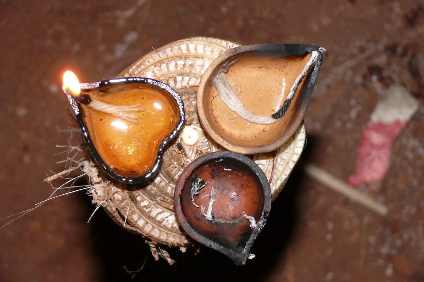 Clay diyas lit for prayer